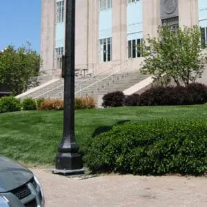 K199 California fixtures accompanied by Coshocton style arms on top of a Belmont pole. Project is in Liberty, Missouri outside of the Clay County courthouse.