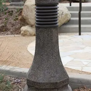 Belmont Bollard - Concrete Multiple lit Belmont style bollards finished with one of our signature concrete décor colors – Midnight Lace.
