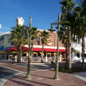 K206 Marina - Canterbury Jr. - The Villages, Florida K206 Marina fixtures accompanied by Marina style arms on top of a Canterbury Jr. metal pole. This project is in front of a popular restaurant located in The Villages, Florida.