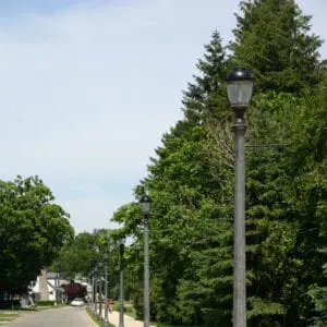 A K135 Fort Erie fixture accompanied by a banner arm all on a Belmont pole.