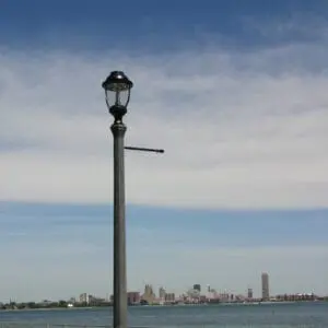 A K135 Fort Erie fixture accompanied by a banner arm on a Belmont pole.
