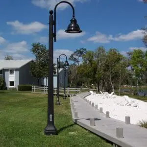 K209 Satellite - St. Louis K209 Satellite fixture accompanied by a Bishop Crook style arm on a St. Louis pole.