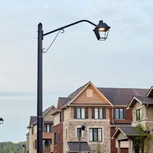 K601D Coach Lantern - Hexagonal Tapered - 2- Grimsby, Ontario. K601D Coach Lantern fixture accompanied by Coach Lantern style arms all on top of an Alexander style pole. This project is in Grimsby, Ontario.