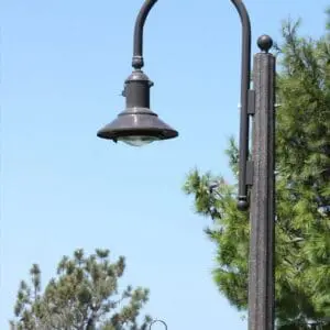 K723 Falcon Ridge - Talisman - 2 A K723 Falconridge Jr. fixture accompanied by a Bishop Crook style arm on top of a Talisman pole.