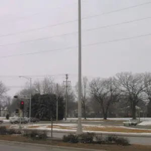 K208 Moderne - Kensington A K208 Moderne fixture accompanied by Wisconsin style arms on a Kensington pole.