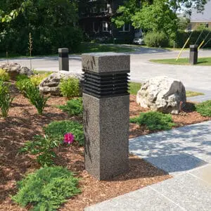 Martello Square Bollard - Concrete Multiple lit Martello Square style bollards finished with one of our signature concrete décor colors- Pearl Gray.