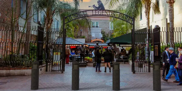 Multiple lit Garrison style bollards finished with one of our signature concrete décor colors - Midnight Lace. This project is in front of Musical Legends Park located in New Orleans.