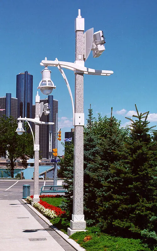 A K833 Solitaire fixture accompanied by a custom style arm on top of a Windsor pole.