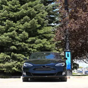 A K803 fixture accompanied by a Pipe style arm on a VoltLock EV Charger Pole.