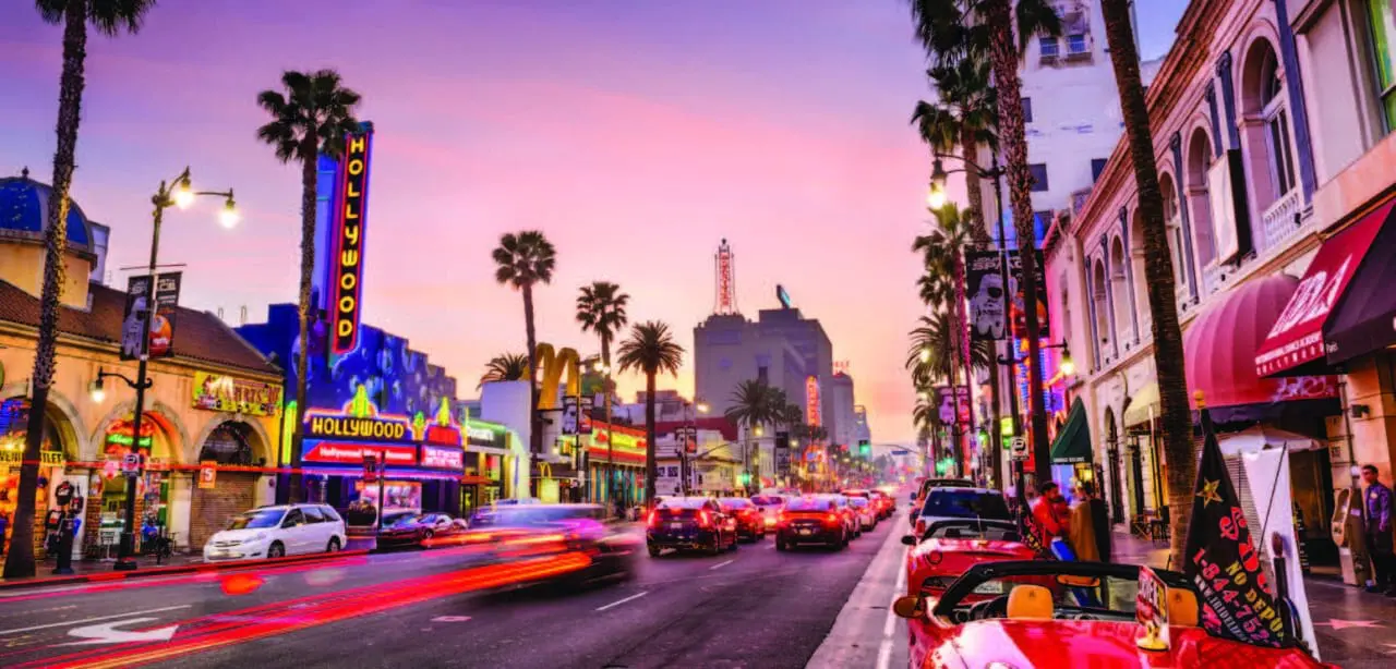 Multiple K803 Solitaire Sr. and K703 Solitaire Jr. fixtures installed on the busy street of Hollywood Blvd, located in Los Angeles, California.
