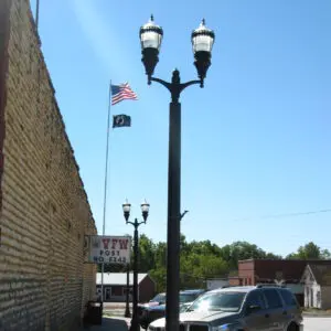 K445 Sol-Lux - Belmont K445 Sol-Lux fixtures accompanied by KA69 Jefferson arms all on top of a Belmont pole.