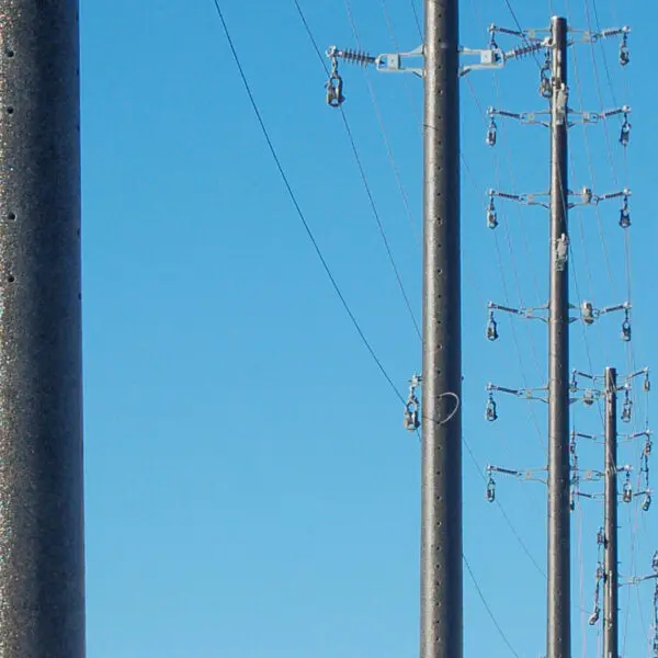 A colored spun concrete utility pole with a 'road crossing' application. This project is off Highway 7 Boulevard in Markham, Ontario.
