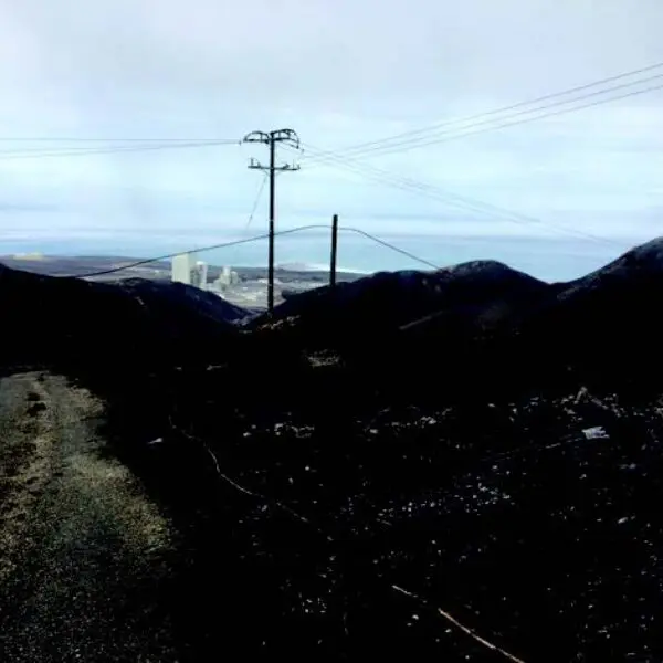 Aftermath of the historical fire at the Vandenberg Air Force Base. The only object left standing amidst the rubble is one of StressCrete's spun concrete poles.