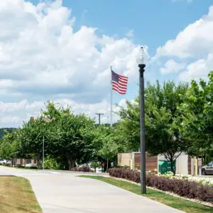K118 Washington - Fluted Tapered - Collegedale, Tennessee A K118 Washington fixture atop a Fluted Tapered pole. This project is near a shopping center located in Collegedale, Tennessee.