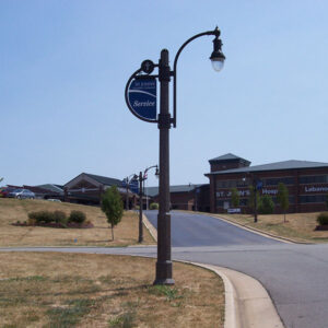 A K833 Solitaire fixture accompanied by banner arms and a custom-made arm on a Classic pole. Project is located at St. John's Hospital in Lebanon, Missouri.