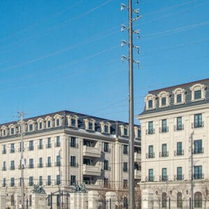 Colored spun concrete poles in a "road crossing" application. This project is located on the side of Highway 7 Boulevard in Markham, Ontario (York Region).