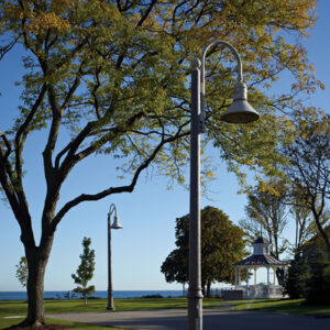 A K208 Moderne fixture accompanied by a Bishop Crook style arm on a Canterbury pole.