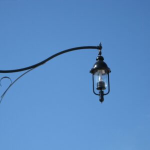 K330 Versailles fixture accompanied by scroll style arm.