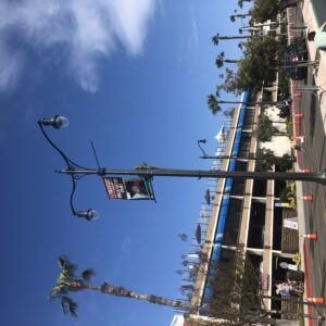 K803 Solitaire Sr. fixtures accompanied by KA30 Scroll with Decorative Scroll arms all on top of a Talisman pole. This project is located in Redondo Beach, California