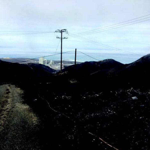 Aftermath of the historical fire at the Vandenberg Air Force Base. The only object left standing amidst the rubble is one of StressCrete's spun concrete poles.