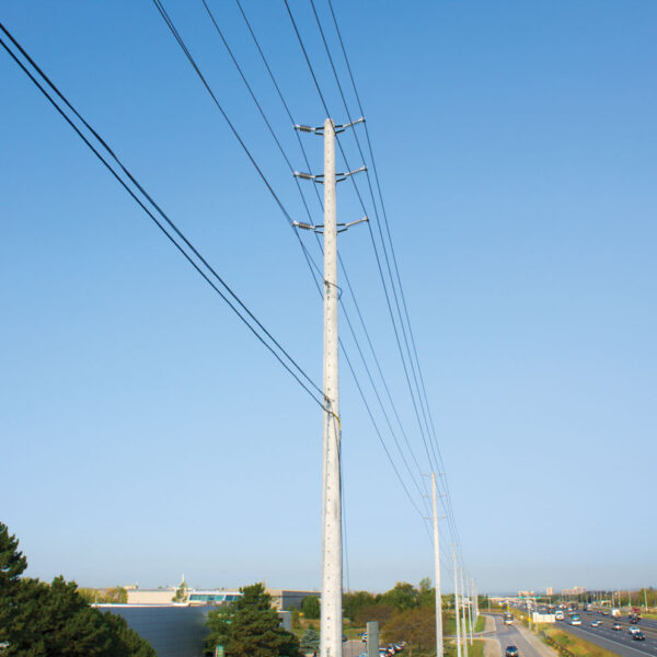 Spun concrete utility poles with a 'road crossing' application. This project is overlooking a busy highway.